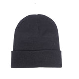 Black beanie hat on a white background